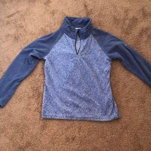 A purple quarter zip